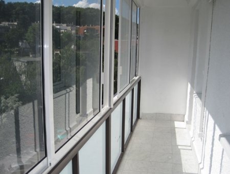 Зачем производить остекление окон и балконов?	